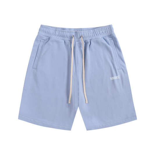 Light blue shorts with pockets and a drawstring.