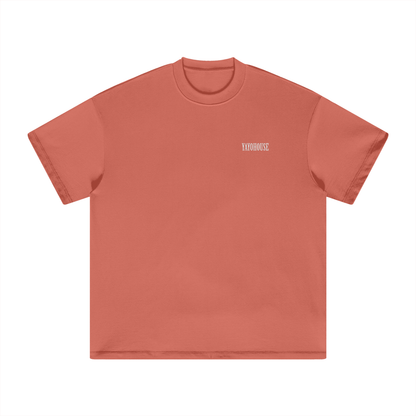Orange t-shirt with a logo.
