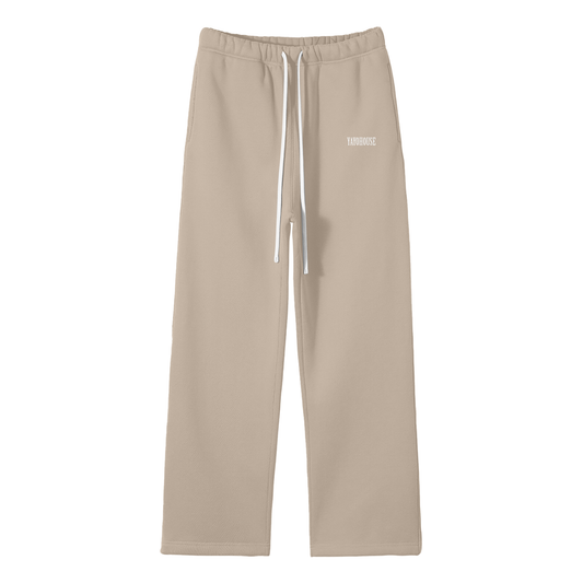 Beige sweatpants with white drawstring.