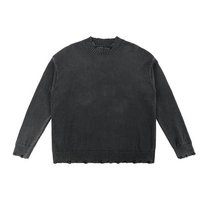 Black knit sweater with ribbed detailing.