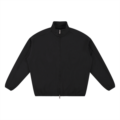 Black zip-up track jacket.
