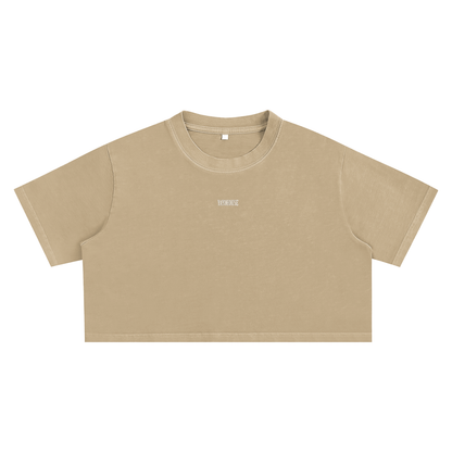 Beige short-sleeved crop top.
