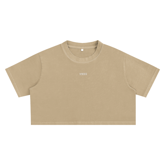 Beige short-sleeved crop top.
