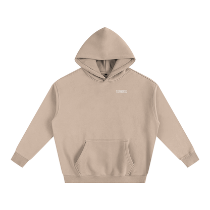 Tan hooded sweatshirt.
