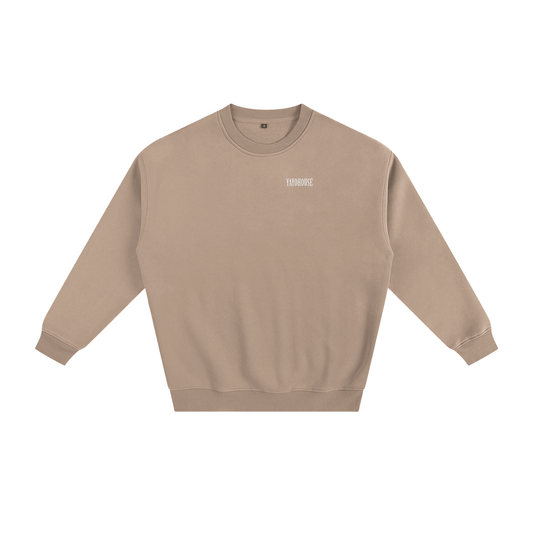Tan crew neck sweatshirt with white lettering.
