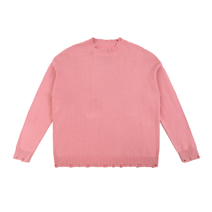 Pink knit sweater with distressed edges.

