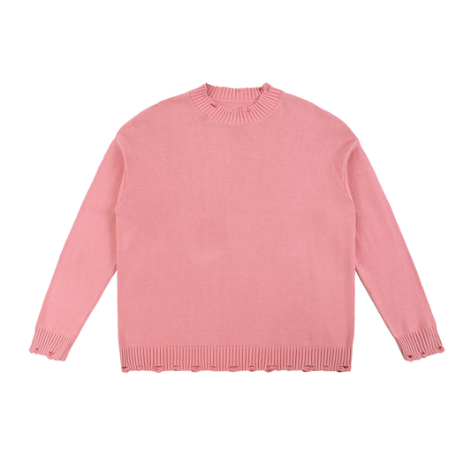 Pink knit sweater with distressed edges.
